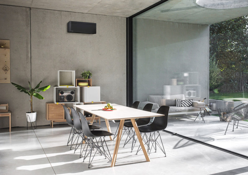 a room with a table and chairs