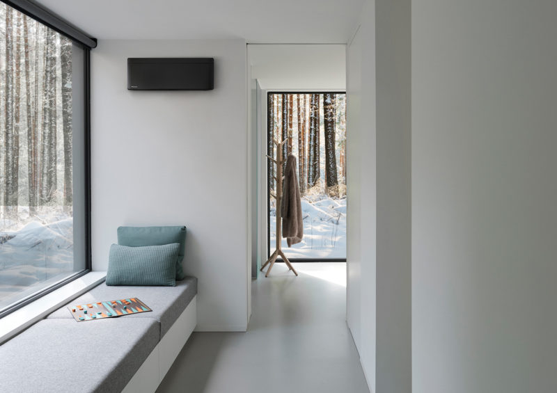 a room with a window and a bench